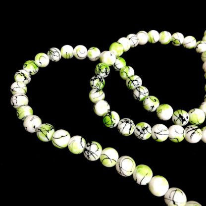 Round green white and black glass beads by strand - diametre 10 mm - length 80 cm