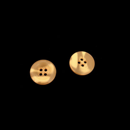 Four-hole round greyish orange plastic buttons - diametre 21 mm - 4 pieces
