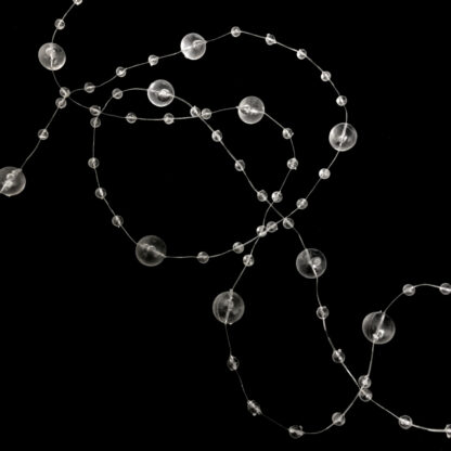 Semi-transparent plastic beads string by metre - diametre 8 mm