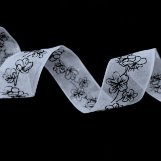 White organza ribbon with black flowers by metre - width 25 mm