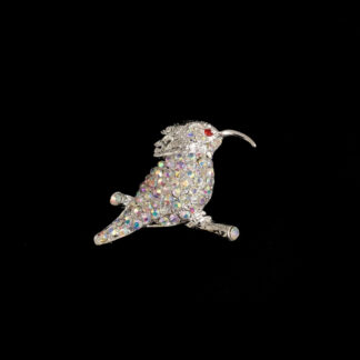 Iridescent rhinestones red eye silvery metal bird on branch brooch - size 48 x 55 mm