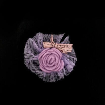 Bluish pink felt flower and orange ribbon bow on light purple net decoration - diametre 65 mm