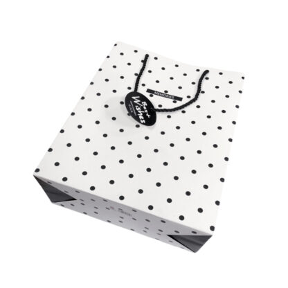 White paper carrier bag with black polka dots - size 260 x 320 mm