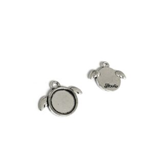 Silvery metal round winged bezel pendant with word Love and glass dome cabochon - size 18 x 23 mm
