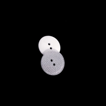 Two-hole round grey and white swastika plastic buttons - diametre 22 mm - 2 pieces
