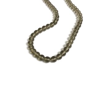 Round transparent greenish brown beads by strand - diametre 8 mm - length 37 cm