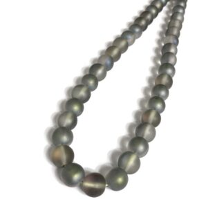 Round iridescent semi-transparent stone beads by strand - diametre 11 mm - length 38 cm