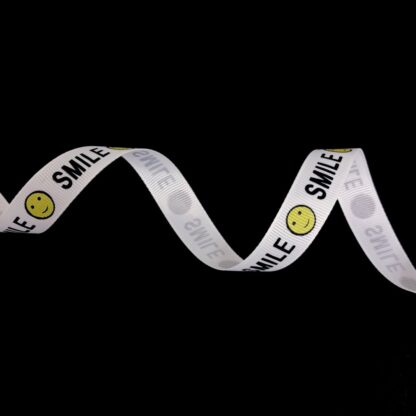 White grosgrain ribbon with yellow smiley face and word SMILE in black - width 15 mm