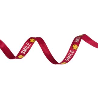 Red grosgrain ribbon with word SMILE in white and yellow smiley face by metre - width 10 mm