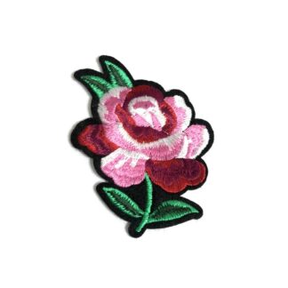 Red white and pink rose with green leaves and stem on black iron-on garment sticker by piece - size 63 x 85 mm