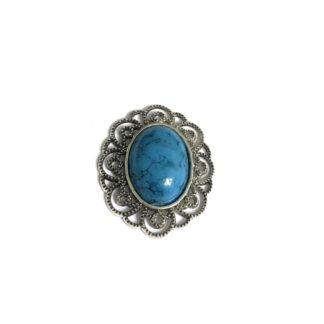 Silvery metal oval ornament with crackle blue cabochon - size 35 x 42 mm