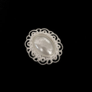 Silvery white oval metal ornament with pearly cabochon - size 36 x 42 mm