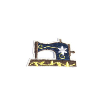 Yellow brown and dark blue sewing machine on white iron-on garment sticker by piece - size 30 x 50 mm