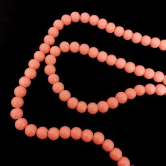 Round peachy orange beads by strand - diametre 8 mm - length 82 cm