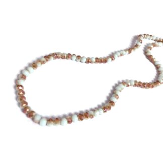 Faceted round iridescent brown and bluish white beads by strand - diametre 5.5 mm - length 45 cm