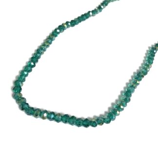 Faceted round iridescent bluish green beads by strand - diametre 6 mm - length 44 cm