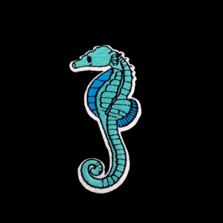 Green and blue seahorse on white iron-on garment sticker by piece - size 35 x 72 mm