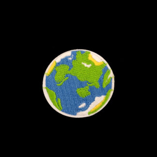 Blue green and yellow earth on white iron-on garment sticker by piece - diametre 50 mm