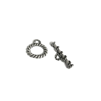 Silvery metal oval twisting toggle clasp - size 16 x 23 mm