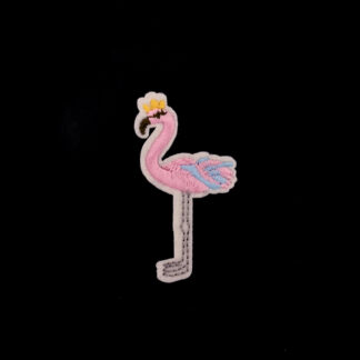 Light pink blue yellow and brown bird on white iron-on garment sticker by piece - size 31 x 60 mm