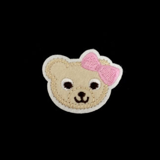Cream white and brown bear head with pink bow iron-on garment sticker by piece - size 37 x 45 mm
