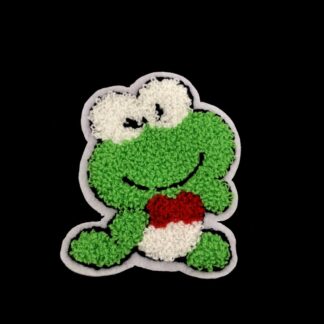 Green black and red frog on white garment applique by piece - size 72 x 92 mm