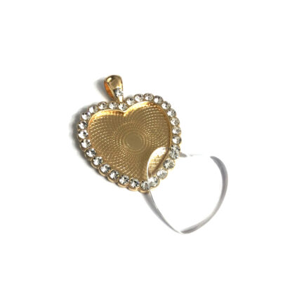 Golden metal heart-shaped bezel pendant with glass cabochon and rhinestone boundary - size 31 x 41 mm