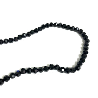 Faceted shiny round black beads by strand - diametre 6 mm - length 54 cm