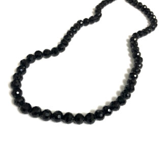 Faceted shiny black beads by strand - diametre 8 mm - length 52 cm