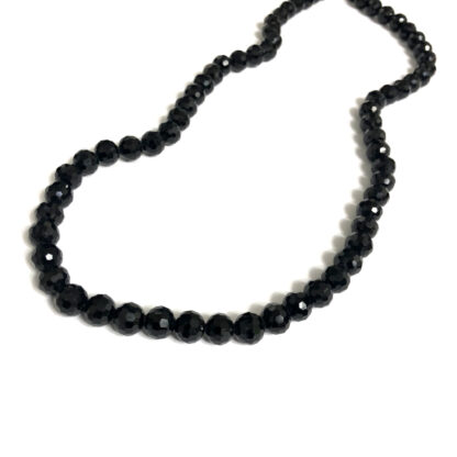 Faceted shiny black beads by strand - diametre 8 mm - length 52 cm