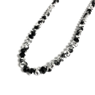 Faceted round silvery and black beads by strand - diametre 8 mm - length 41 cm