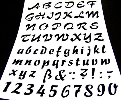 White plastic stencil depicting letters and numbers - size A4