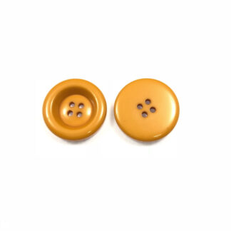 Four-hole round greyish light orange plastic button - diametre 30 mm