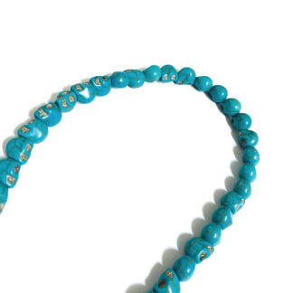 Turquoise green skull beads by strand - size 8 x 10 mm - length 38 cm