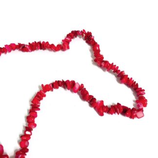 Pinkish red stone beads by strand - size 6 x 10 mm - length 49 cm