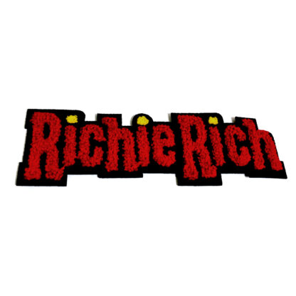 Yellow and red words Richie Rich on black garment applique by piece - 60 x 190 mm