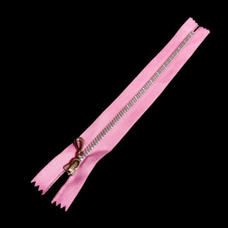 Light pink zipper with plastic teeth and metal slider - length 20 cm