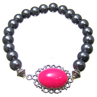 Oval pink cabochon on silvery metal base bluish dark grey beads bracelet - diametre 9 mm