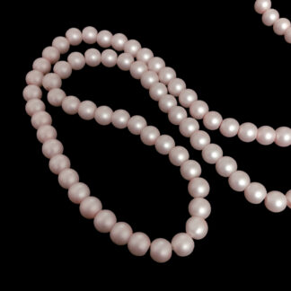 Round pinkish beige beads by strand - diametre 8 mm - length 80 cm