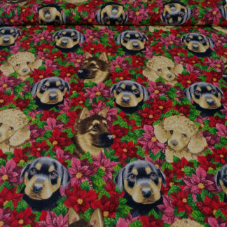 Different dog heads on red and pink flowers and green leaves print pure cotton quilting fabric - width 110 cm
